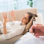 Woman discussing with therapist during a counseling session.